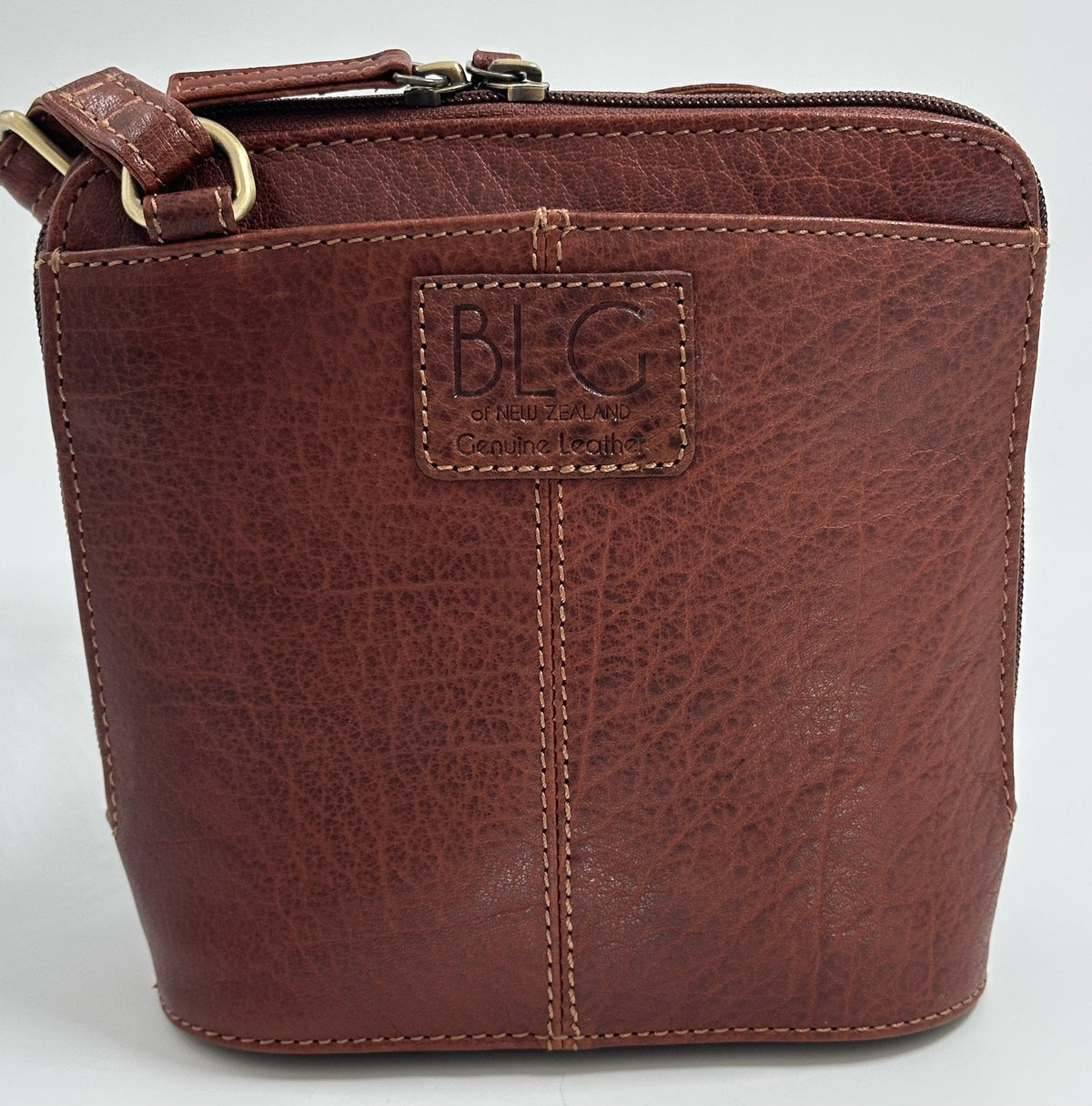Baron Dana Small Bucket Bag in Cognac leather, back with BLG emblem