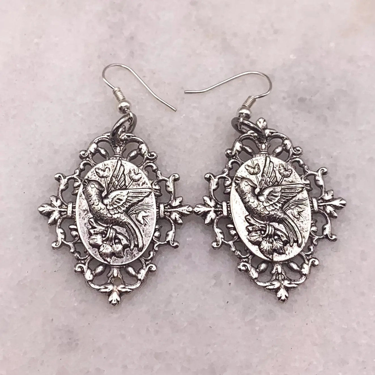 Ghost and Lola Sky Whisperer Earrings, antique silver carved bird cameo pair