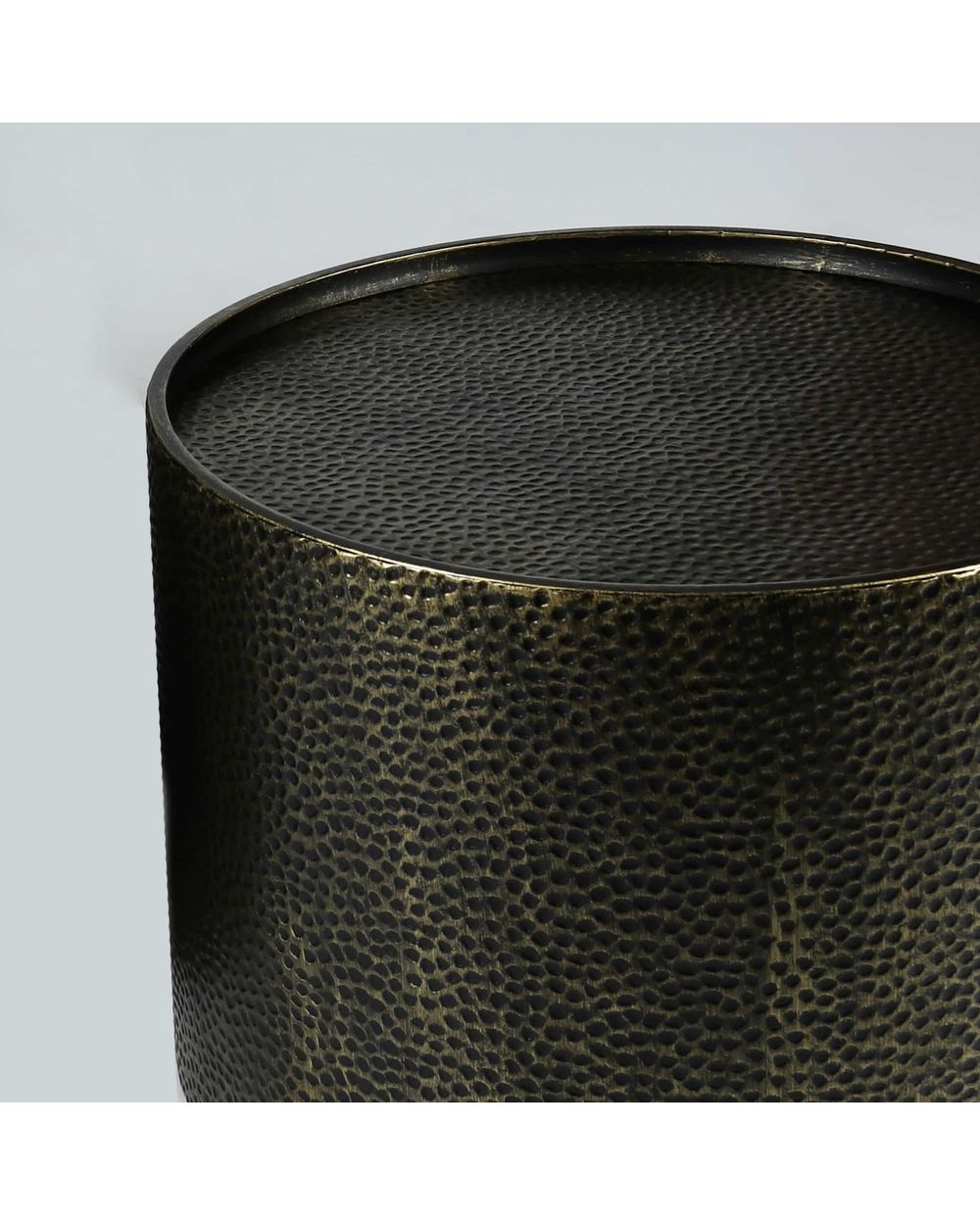 Le Forge Drum Coffee Table in antique gold, detail view